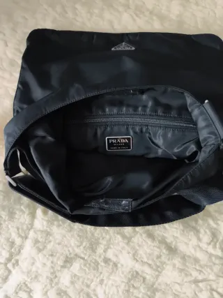 Bolso de viaje Prada negro original.