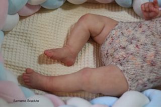 Bebé Reborn realista ojos azules