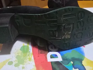 Botas altas Desigual negras y verdes