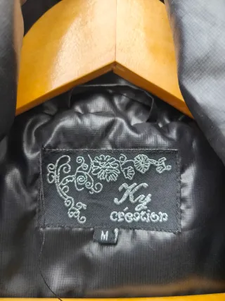 Abrigo chubasquero mujer negro