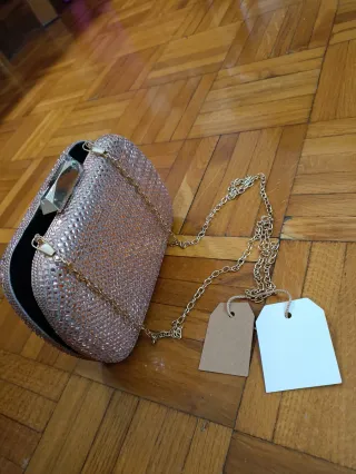 Bolso clutch rosa dorado con cristales