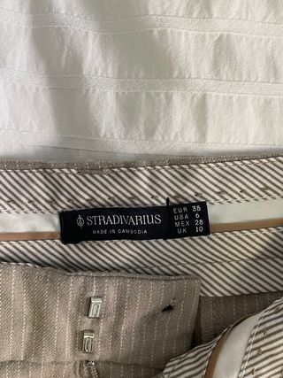 Pantalones de pinza campana beige y gris