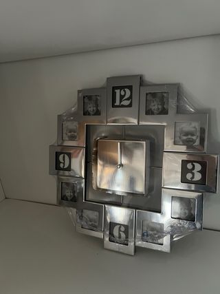 Orologio da parete con 8 portafoto