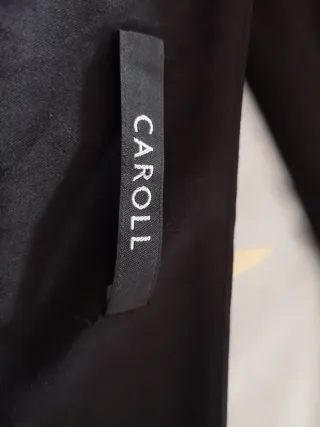 Falda Caroll gris y negra con volante. Forro.