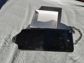 Portafoglio uomo Bailini nero con catena.