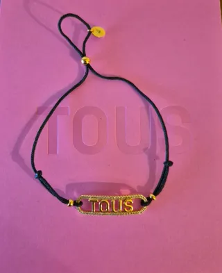 Pulsera Tous Negra y Dorada