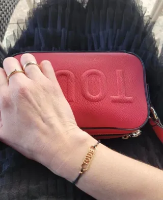 Pulsera Tous Negra y Dorada