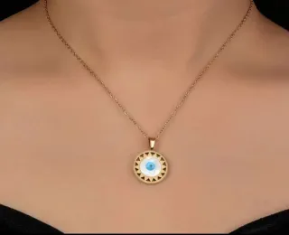 Colgante Ojo de Horus Acero Dorado