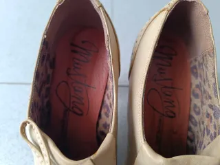 Botines tacón flecos beige