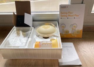 Sacaleches Medela Swing Flex + discos de lactancia