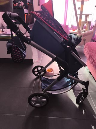 Cochecito de muñecas con capota y bossa