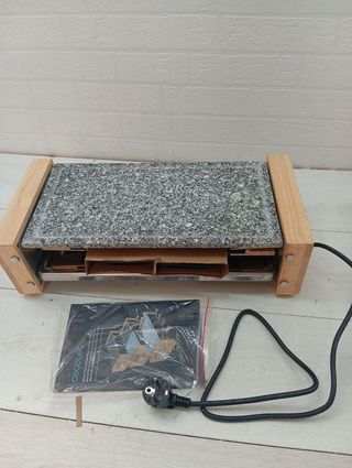 Raclette in pietra naturale con 8 padelle per griglia