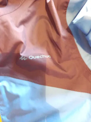 Impermeable infantil Quechua azul y naranja t10