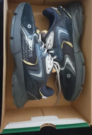 Lacoste L003 Zapatillas Negras y Doradas