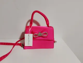 Bolso rosa con lazo y pedrería