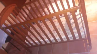 Cuna de madera marrón