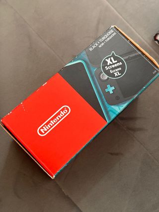 Nintendo 2DS XL Negra y Multicolor