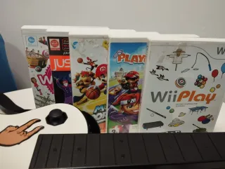 Nintendo Wii + Accesorios y Juegos