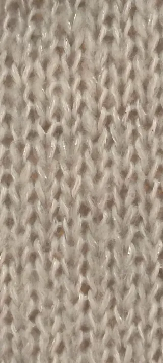 Jersey cuello alto gris con bolsillo