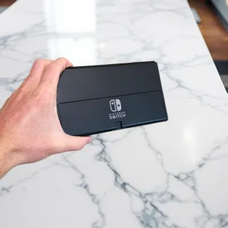 Nintendo Switch OLED + Funda + Mando