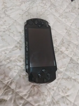 PSP Sony Nera + 5 Giochi