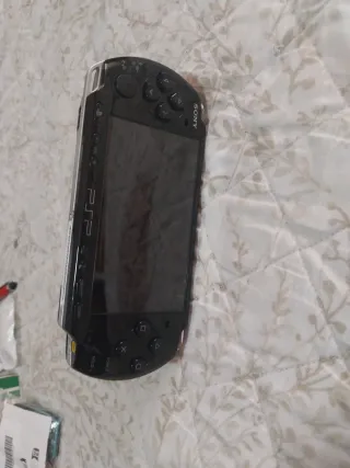 PSP Sony Nera + 5 Giochi