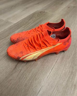 Scarpe da calcio Puma arancioni e gialle