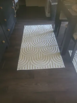 Set di quattro tappeti bianchi