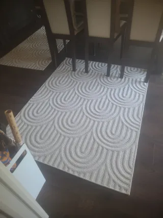 Set di quattro tappeti bianchi