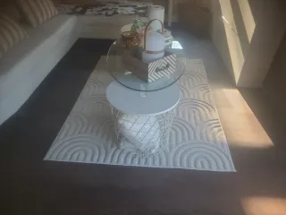 Set di quattro tappeti bianchi