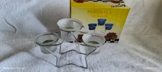 Portacandele a forma di stella con candele incluse