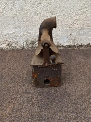 Plancha antigua de hierro