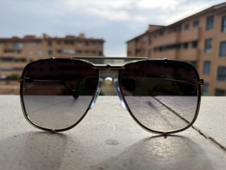 Occhiali da sole Gucci grigio azzurro e dorati