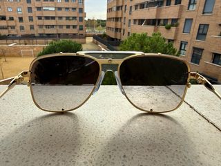 Occhiali da sole Gucci grigio azzurro e dorati