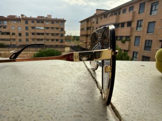 Occhiali da sole Gucci grigio azzurro e dorati