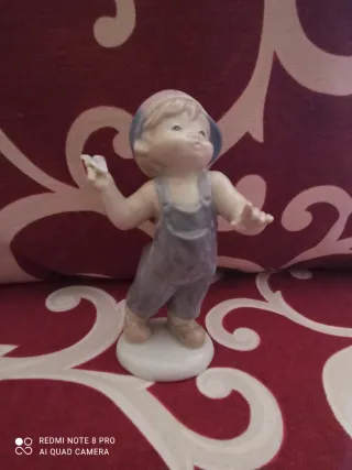 Statuina bimbo porcellana