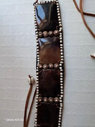 Cintura con tartaruga e perline