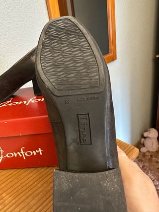 Zapatos negros con flecos