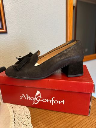 Zapatos negros con flecos