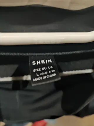 Body negro manga larga con abertura