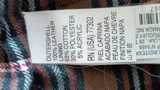 Cazadora de piel marrón con forro cuadros