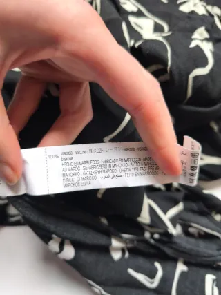 Blusa estampada caras blanco y negro