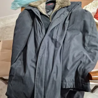 Giaccone uomo nero con pelliccia