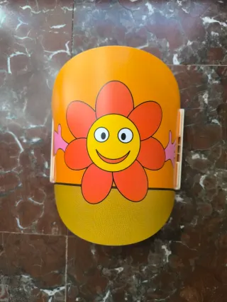 Applique murale infantile con fiore sorridente