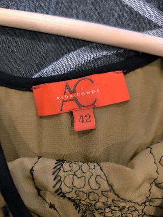 Vestido mujer dorado con detalles negros