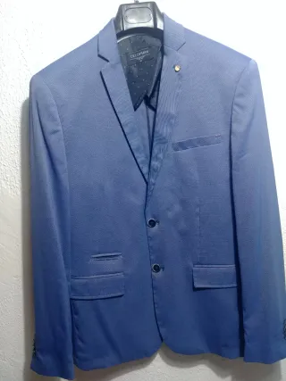 Americana CELOPMAN Azul .En perfecto estado.