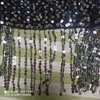 Torera lentejuelas flecos