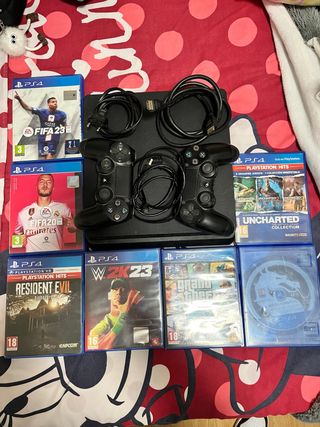 PS4 (PlayStation 4) con 2 mandos y juegos