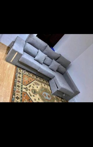 Divano modulare grigio in tessuto