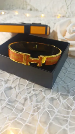 Pulsera Hermès Dorada y Naranja Cierre Click